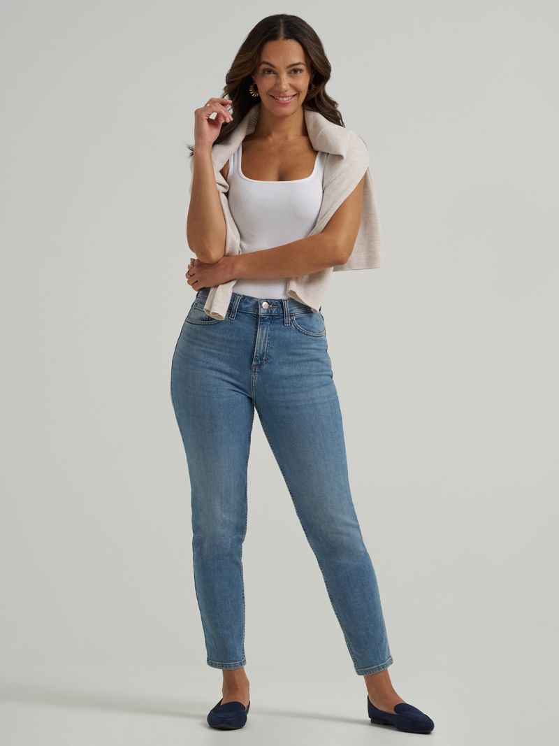 High-rise blue mom jeans with room through the hips and ankle-length legs