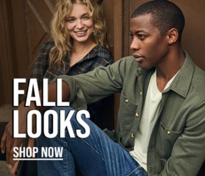 man and woman dressed for fall
