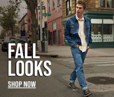 man walking across street wearing lee fall layers