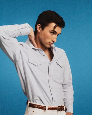 Close-up of Lee × J.Crew denim showing stitching, texture, and hardware details.