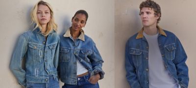 Group of friends leaning on a wall wearing vintage 70s and 80s Rider Jackets from Lee.