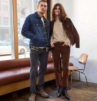 Couple in coffee shop wearing Lee Corduroy Styles