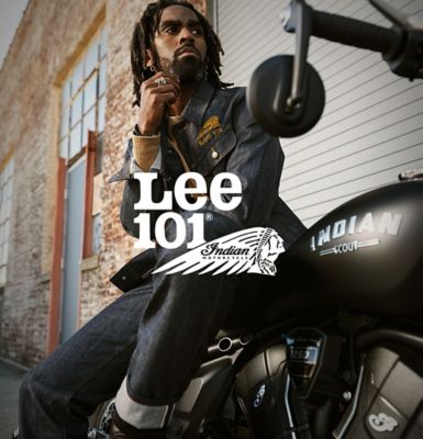 Man sitting on Indian Motorcycle wearing Lee 101 x Indian Motorcycle Collab gear.