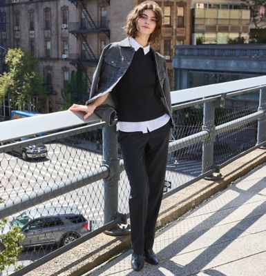 Woman on city rooftop wearing Wrinkle Free, Worry-Free pants from Lee.